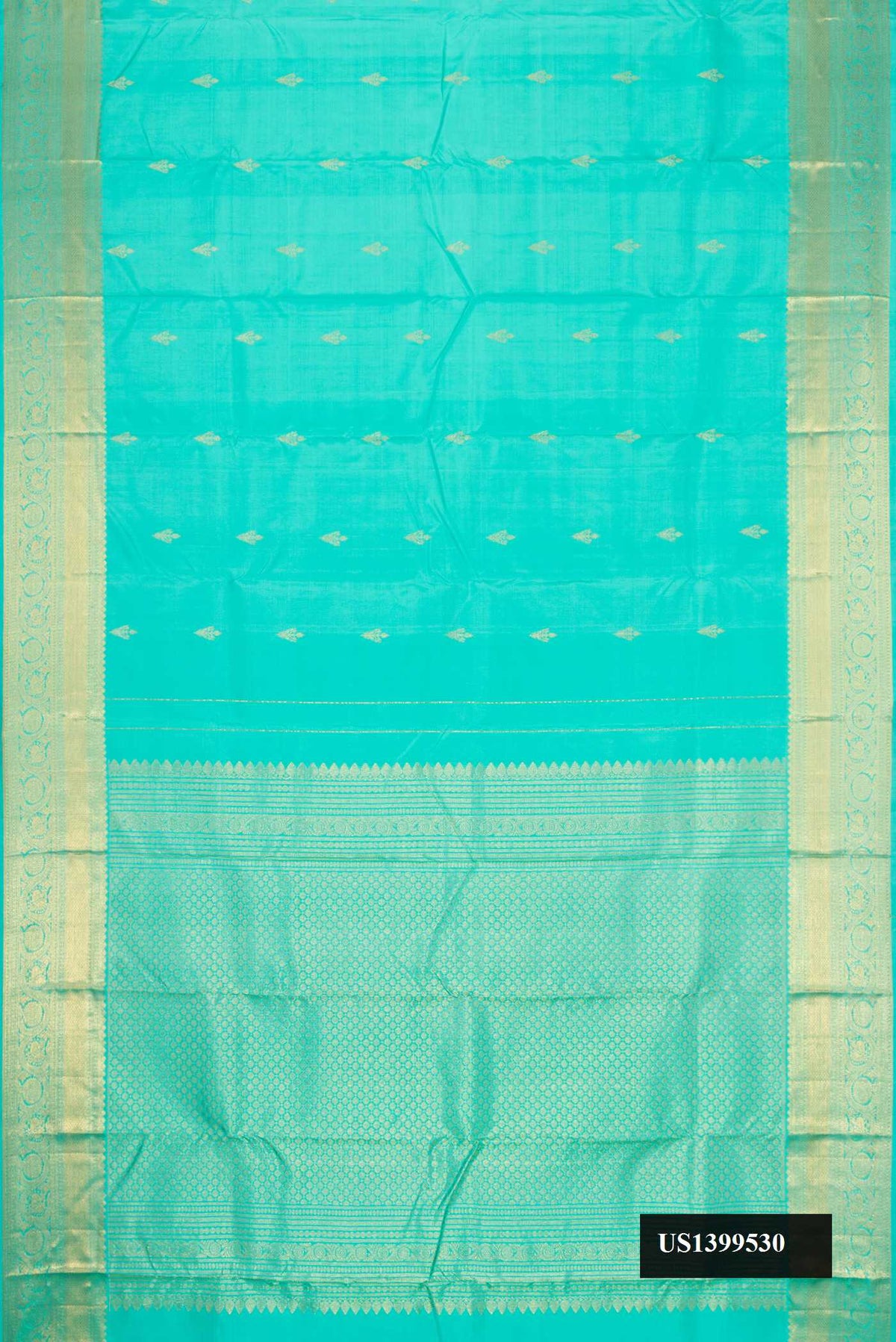 Light Blue Dual Tone Kanchipuram Silk Saree with Zari Butta on the body and Zari Border.  displayed on a mannequin