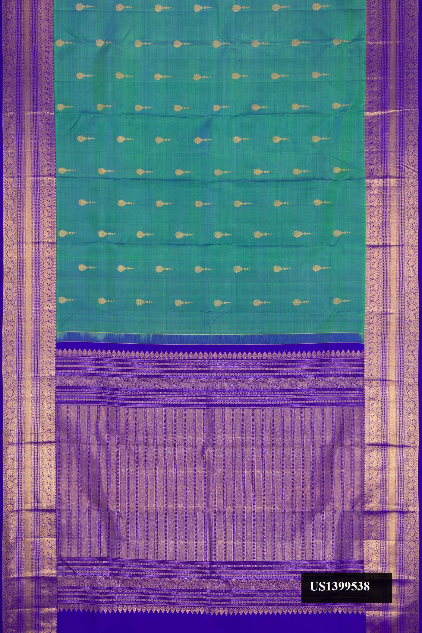 Green Dual Tone Kanchipuram Silk Saree with Zari Butta on the body and Zari Border.  displayed on a mannequin