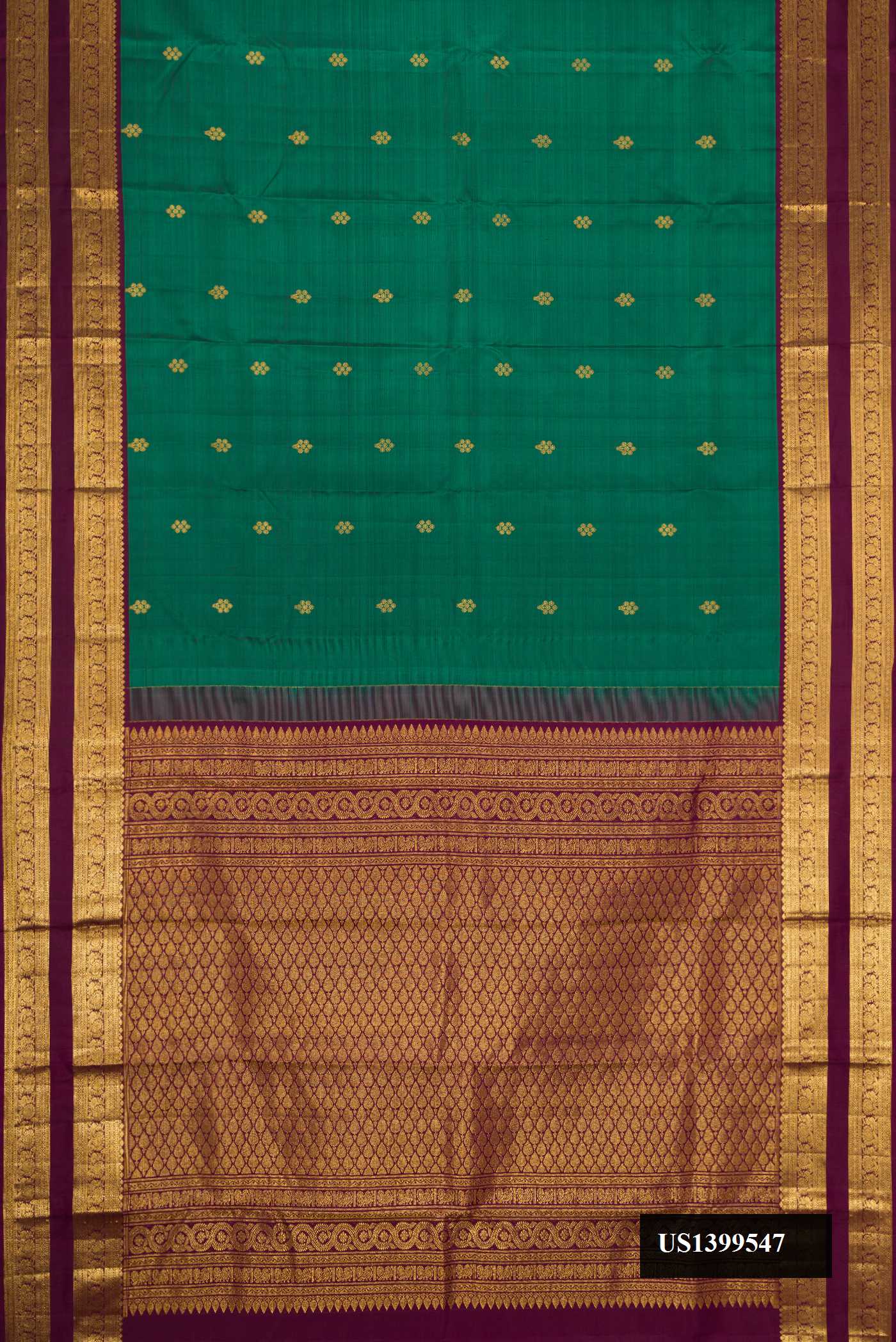 Green Dual Tone Kanchipuram Silk Saree with Zari Butta on the body and Zari Border.  displayed on a mannequin