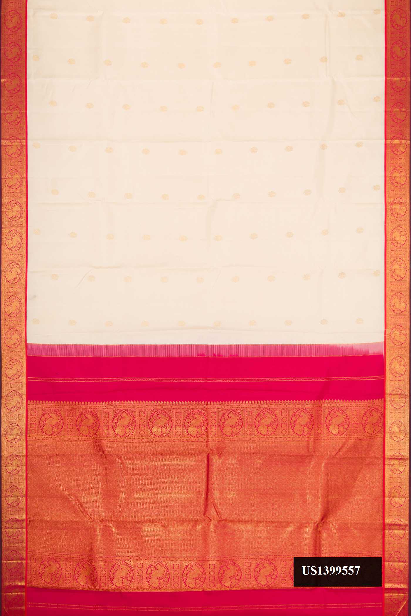 Beige Dual Tone Kanchipuram Silk Saree with Zari Butta on the body and Zari Border.  displayed on a mannequin