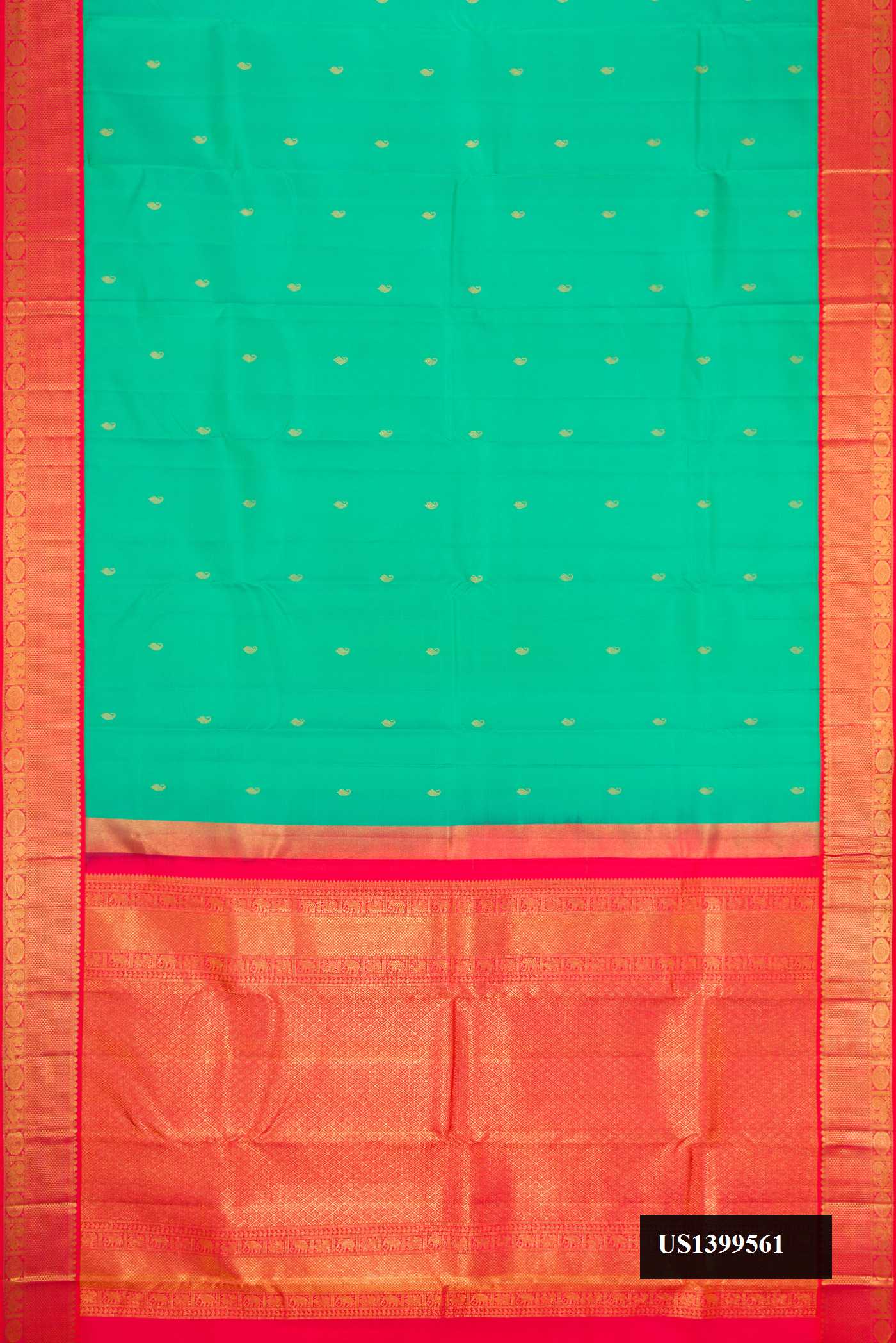 Green Dual Tone Kanchipuram Silk Saree with Zari Butta on the body and Zari Border.  displayed on a mannequin