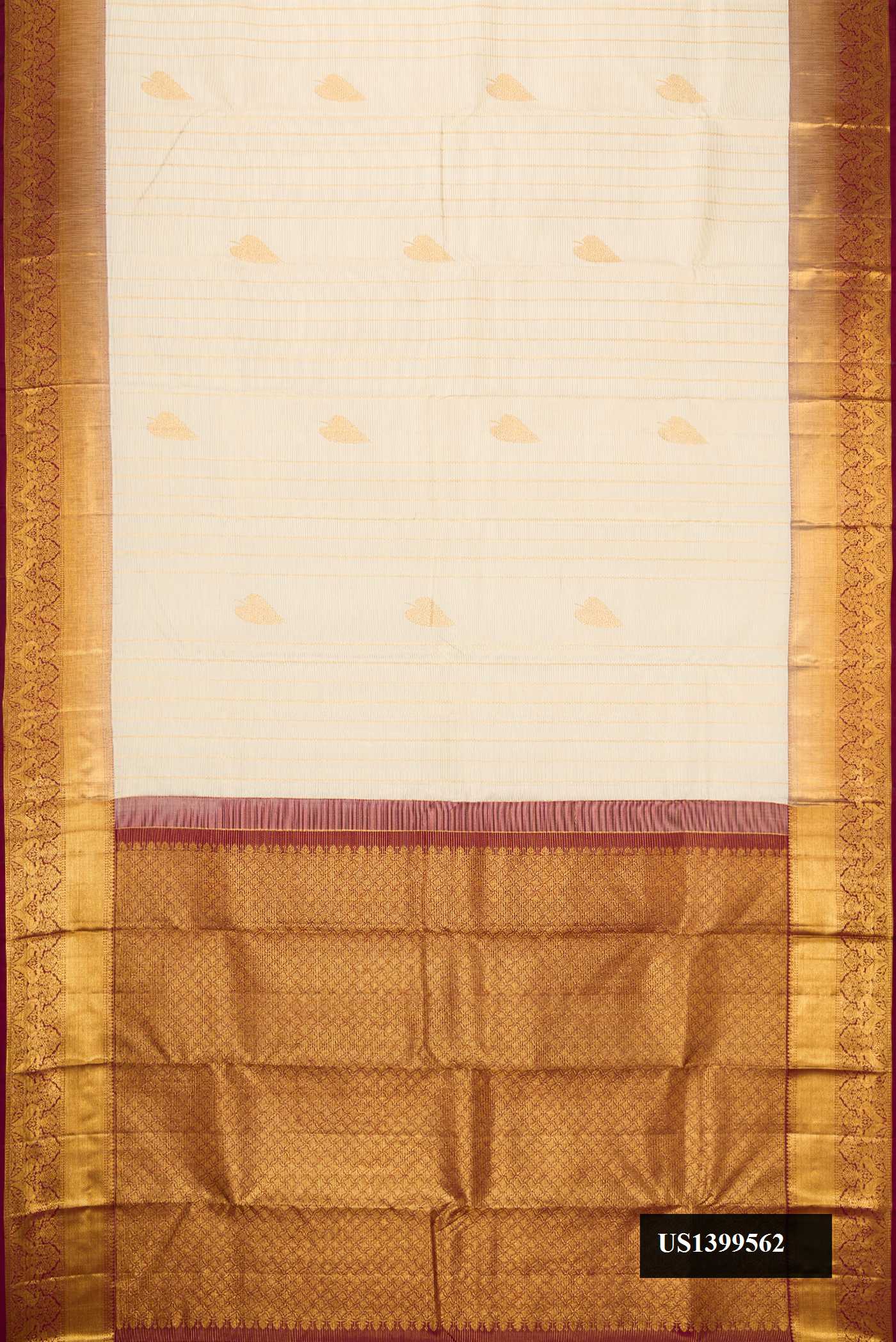 Off White Dual Tone Kanchipuram Silk Saree with Zari Butta on the body and Zari Border.  displayed on a mannequin
