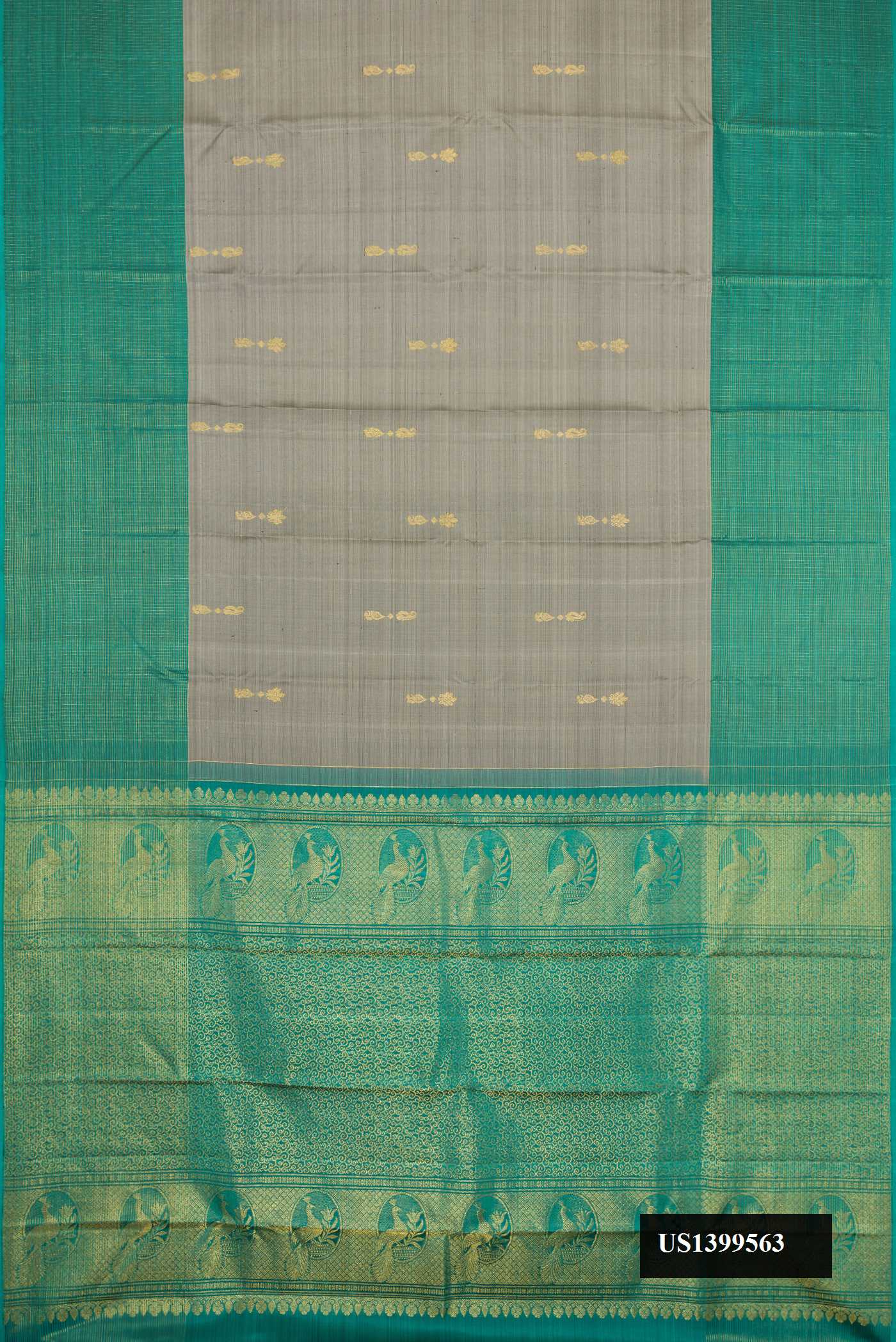 Grey Dual Tone Kanchipuram Silk Saree with Zari Butta on the body and Zari Border.  displayed on a mannequin