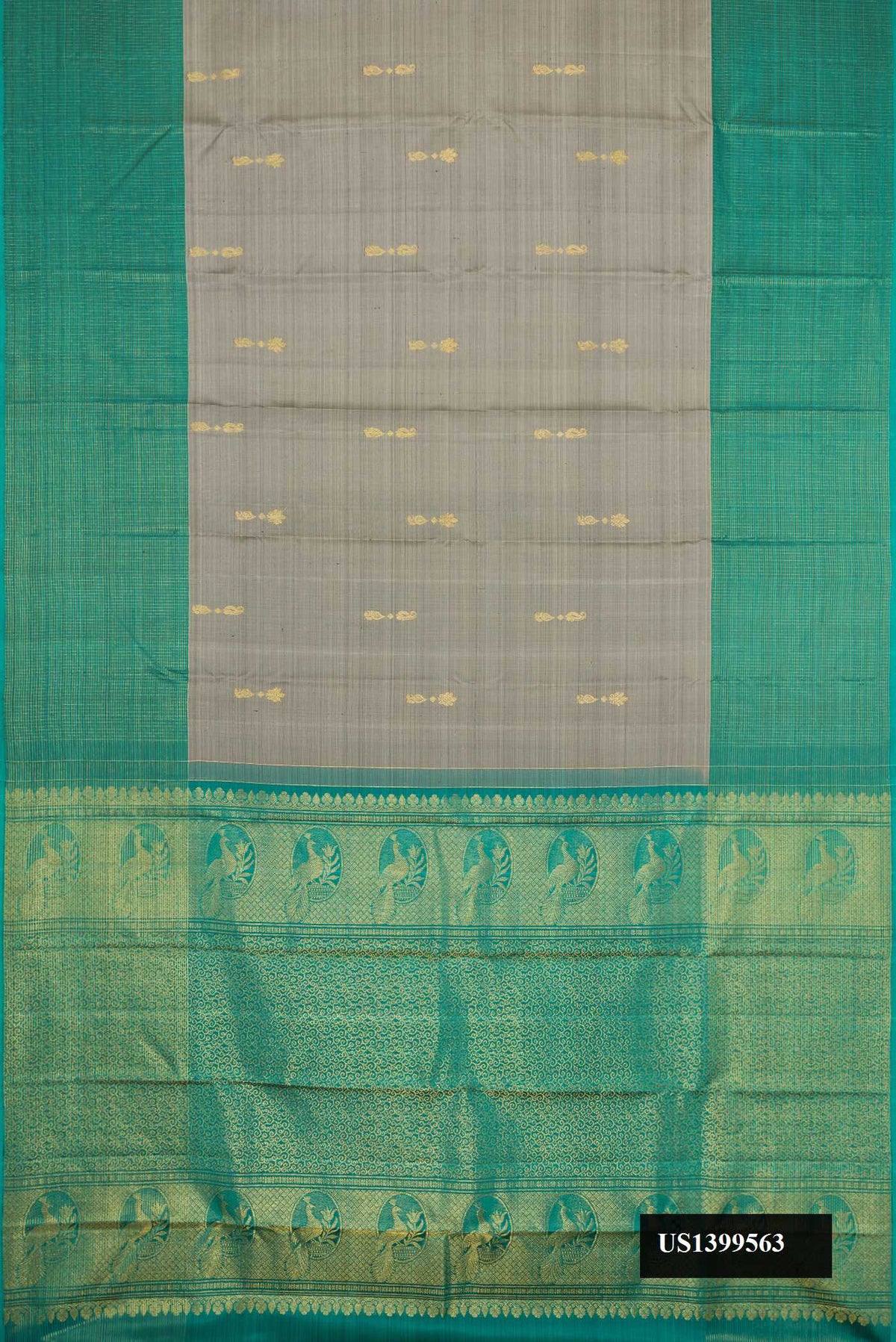 Grey Dual Tone Kanchipuram Silk Saree with Zari Butta on the body and Zari Border.  displayed on a mannequin