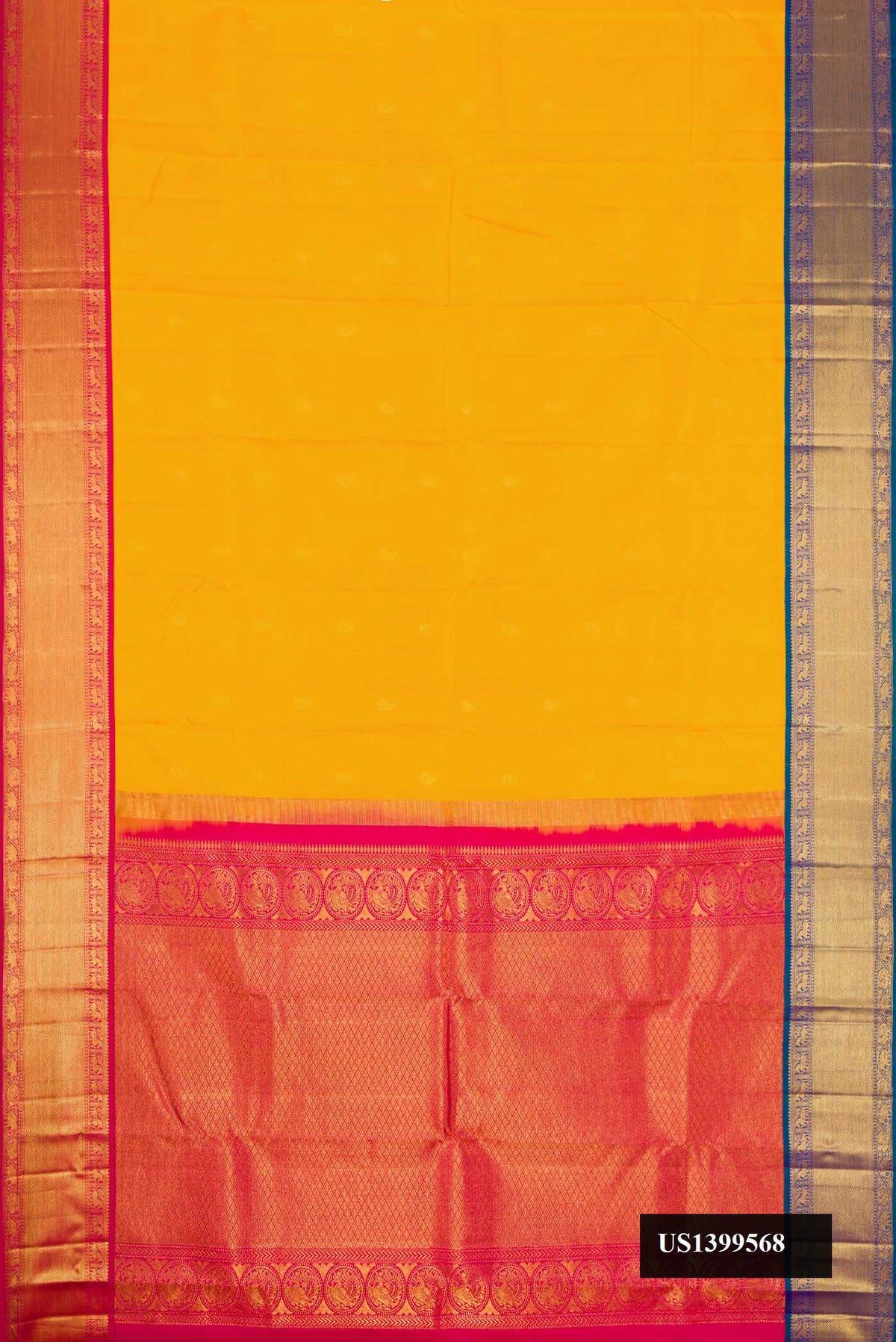 Mustard Dual Tone Kanchipuram Silk Saree with Zari Butta on the body and Ganga Jamuna Border.  displayed on a mannequin