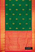 Bottle Green Dual Tone Kanchipuram Silk Saree with Zari Butta on the body and Zari Border.  displayed on a mannequin