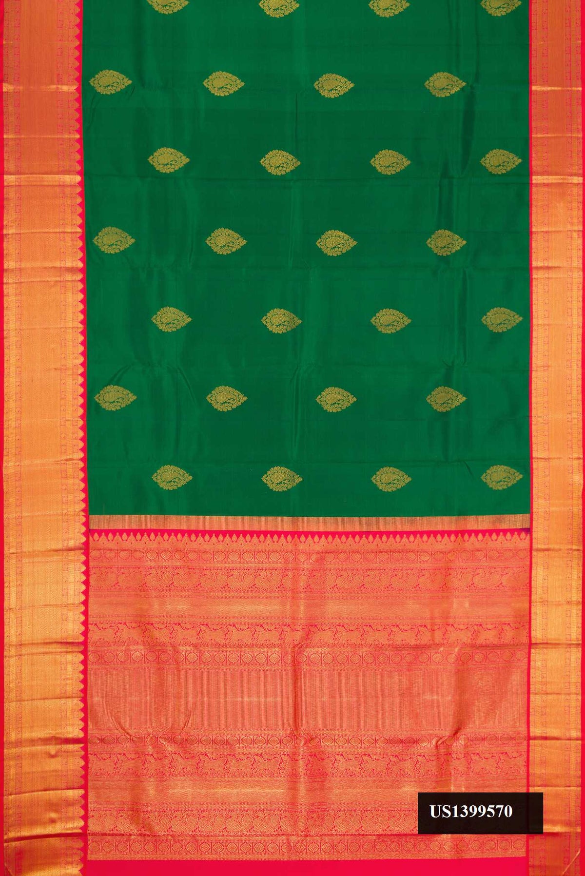 Bottle Green Dual Tone Kanchipuram Silk Saree with Zari Butta on the body and Zari Border.  displayed on a mannequin