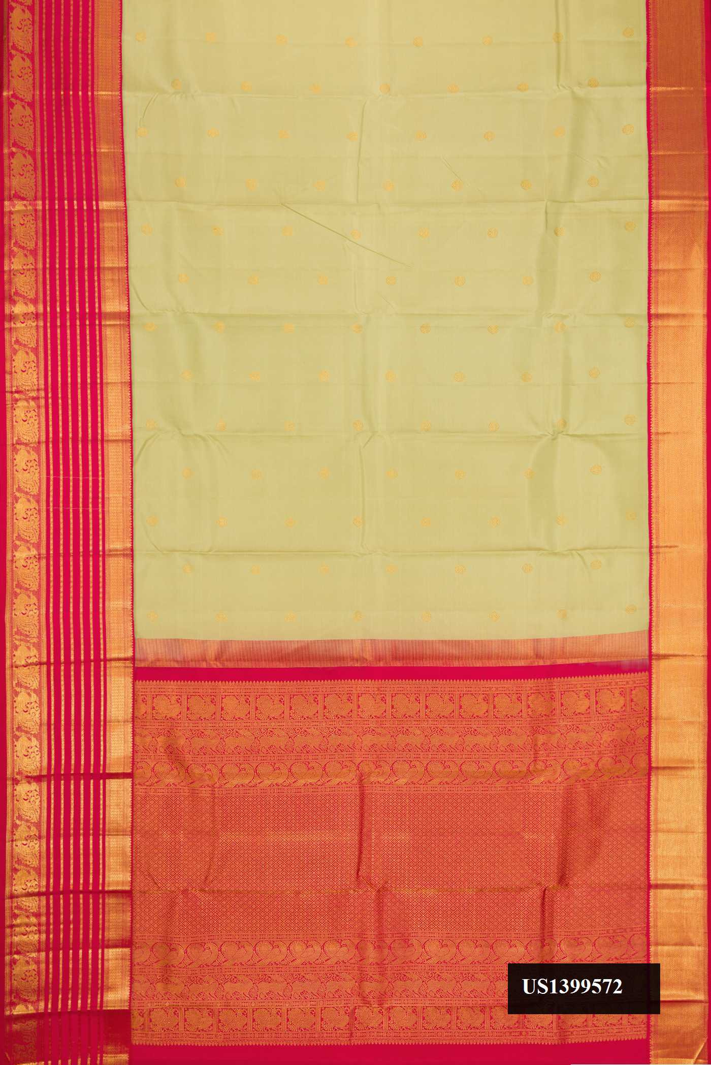 Pista Green Dual Tone Kanchipuram Silk Saree with Zari Butta on the body and Zari Border.  displayed on a mannequin
