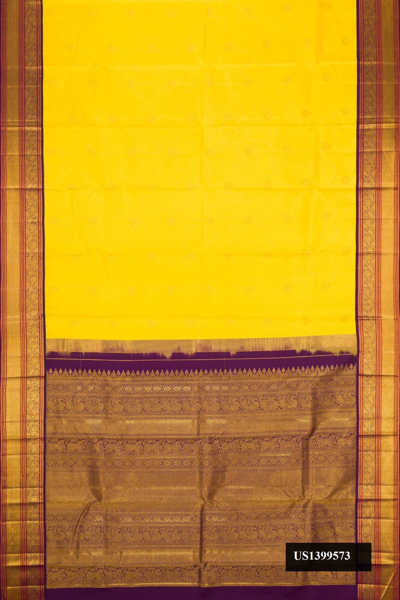 Yellow Dual Tone Kanchipuram Silk Saree with Zari Butta on the body and Zari Border.  displayed on a mannequin