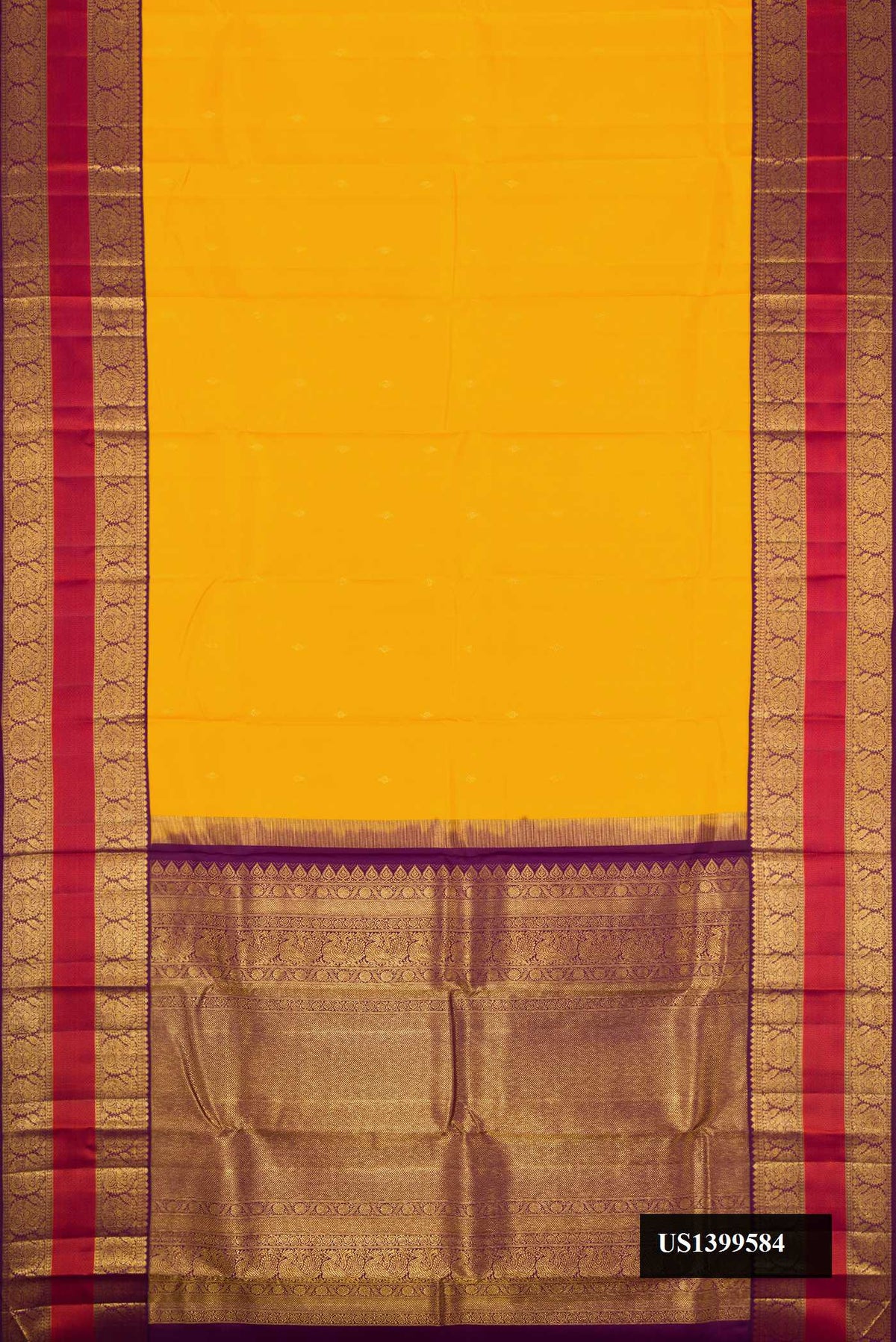 Mustard Dual Tone Kanchipuram Silk Saree with Zari Butta on the body and Zari Border.  displayed on a mannequin