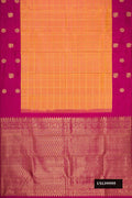 Mustard Dual Tone Kanchipuram Silk Saree with Checked design on the body and Fancy Border.  displayed on a mannequin