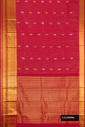 Maroon Dual Tone Kanchipuram Silk Saree with Stripes on the body and Zari Border.  displayed on a mannequin
