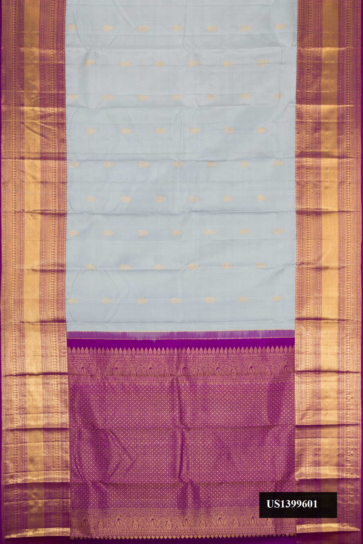 Grey Dual Tone Kanchipuram Silk Saree with Zari Butta on the body and Zari Border.  displayed on a mannequin