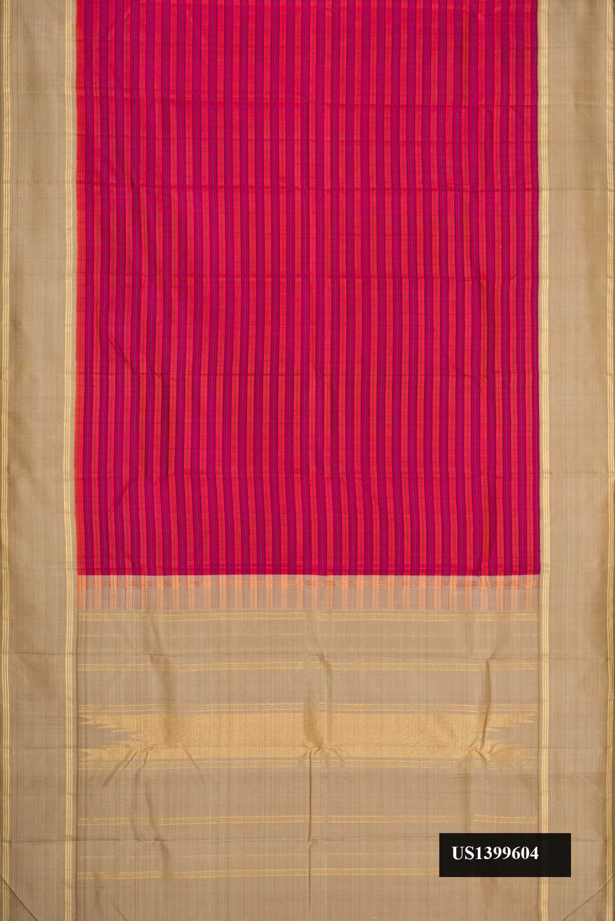 Orange and Magenta Dual Tone Kanchipuram Silk Saree with Stripes on the body and Zari Border.  displayed on a mannequin