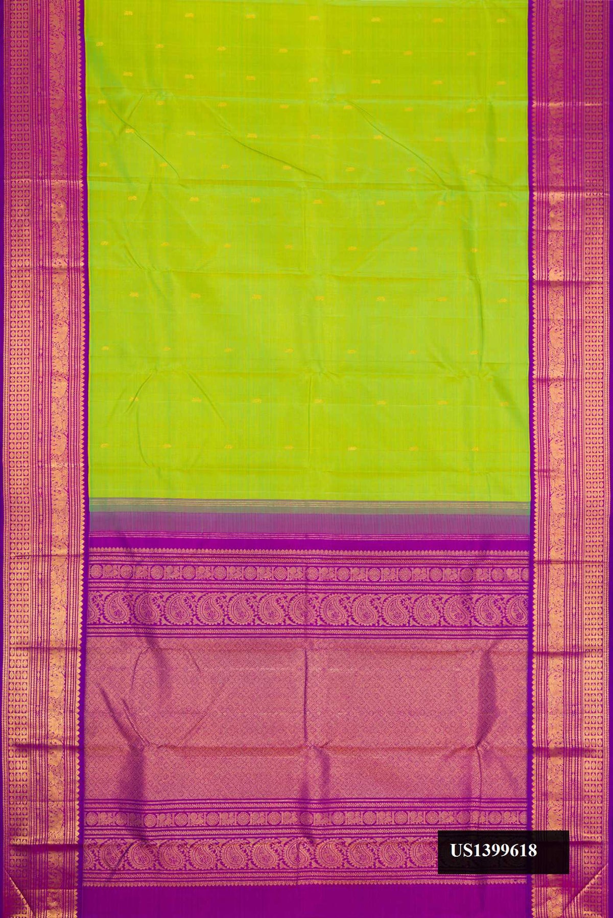 Parrot Green Dual Tone Kanchipuram Silk Saree with Zari Butta on the body and Zari Border.  displayed on a mannequin
