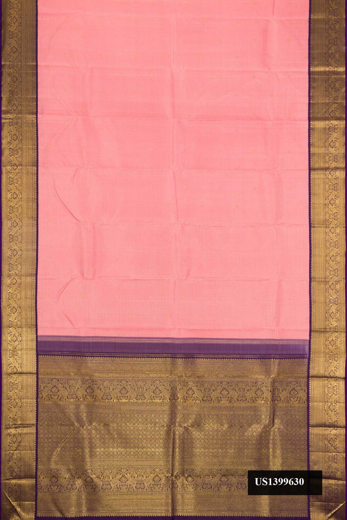 Golden Peach Dual Tone Kanchipuram Silk Saree with Checked design on the body and Zari Border.  displayed on a mannequin