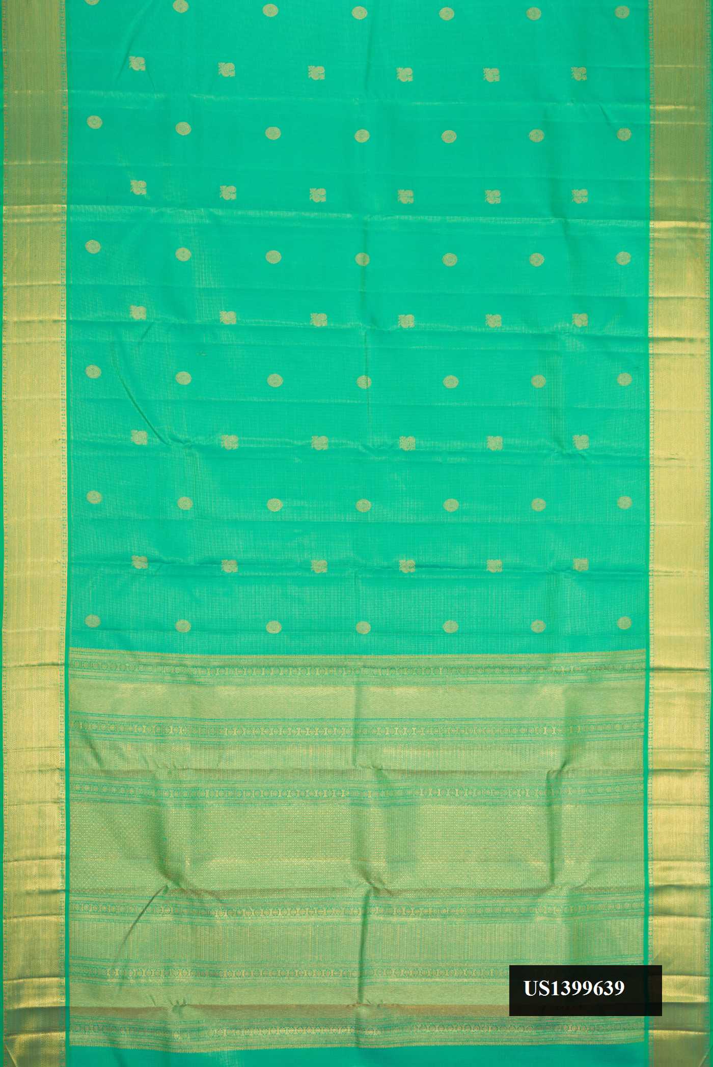 Sea Green Dual Tone Kanchipuram Silk Saree with Stripes on the body and Zari Border.  displayed on a mannequin