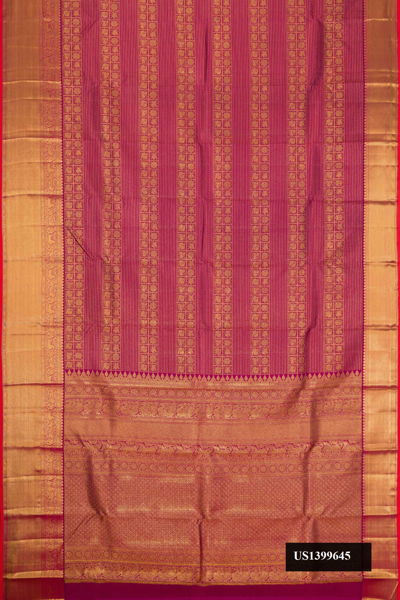 Magenta Dual Tone Kanchipuram Silk Saree with Zari Brocade on the body and Zari Border.  displayed on a mannequin