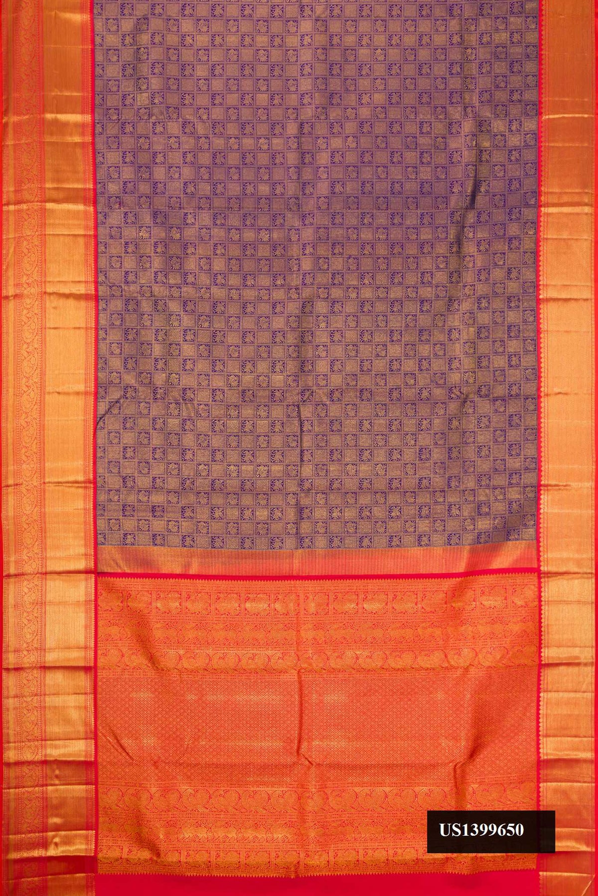 Navy Blue Dual Tone Kanchipuram Silk Saree with Zari Brocade on the body and Zari Border.  displayed on a mannequin