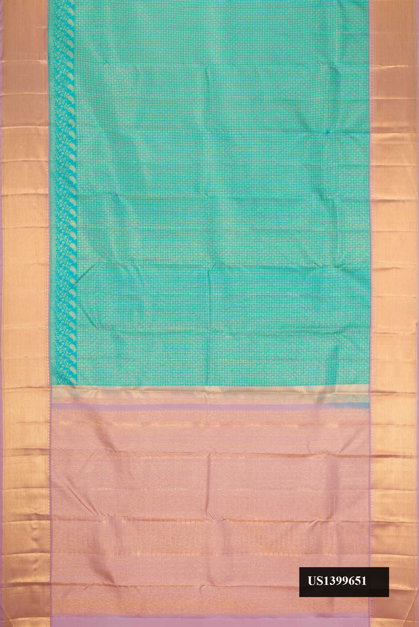 Sea Green Dual Tone Kanchipuram Silk Saree with Zari Brocade on the body and Zari Border.  displayed on a mannequin
