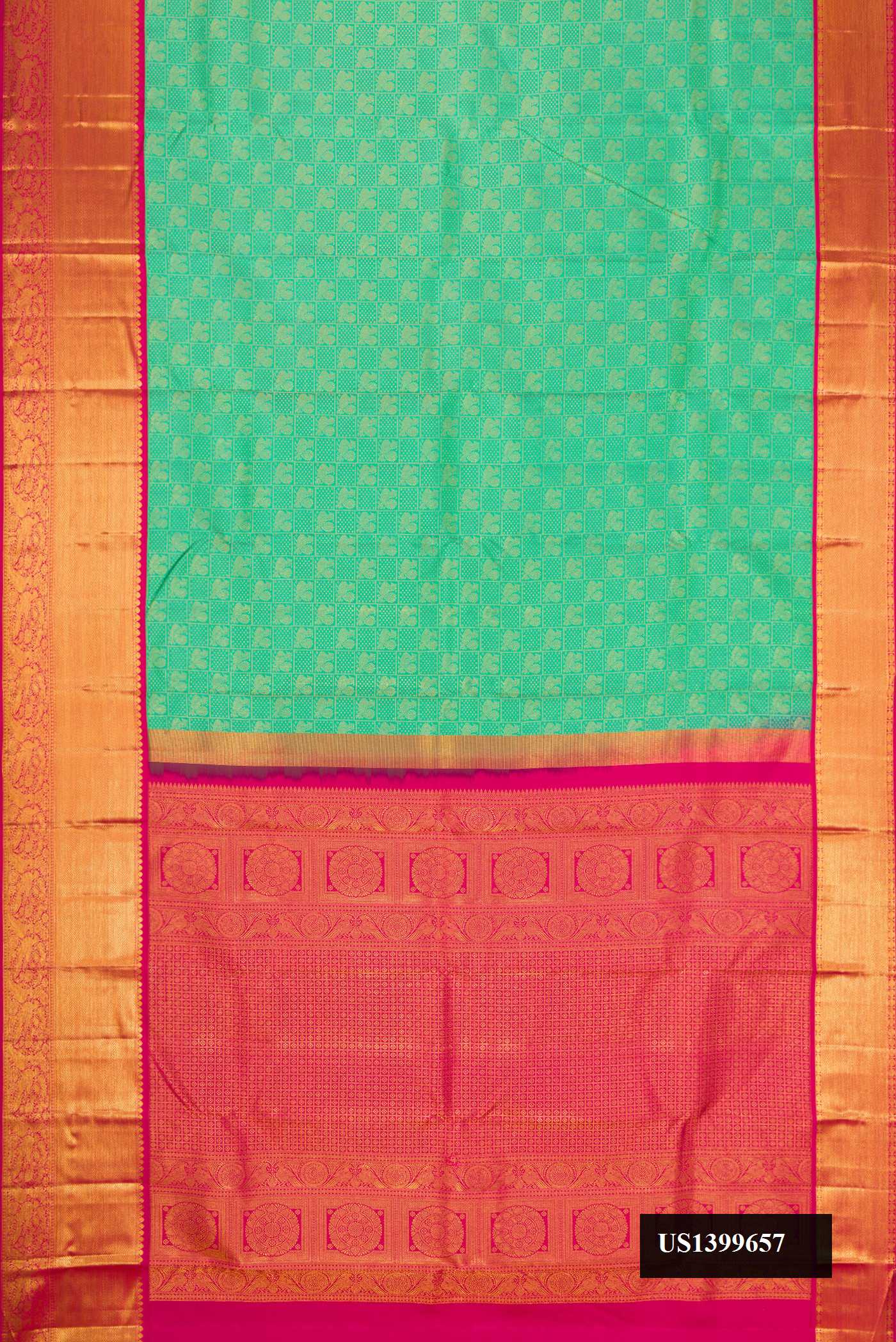 Green Dual Tone Kanchipuram Silk Saree with Zari Brocade on the body and Zari Border.  displayed on a mannequin