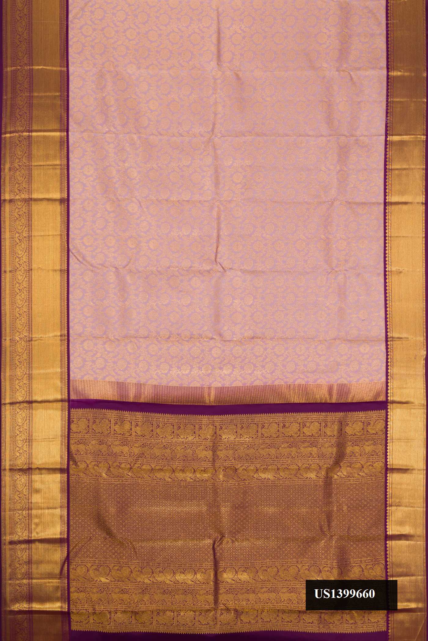 Lavender Dual Tone Kanchipuram Silk Saree with Zari Brocade on the body and Zari Border.  displayed on a mannequin
