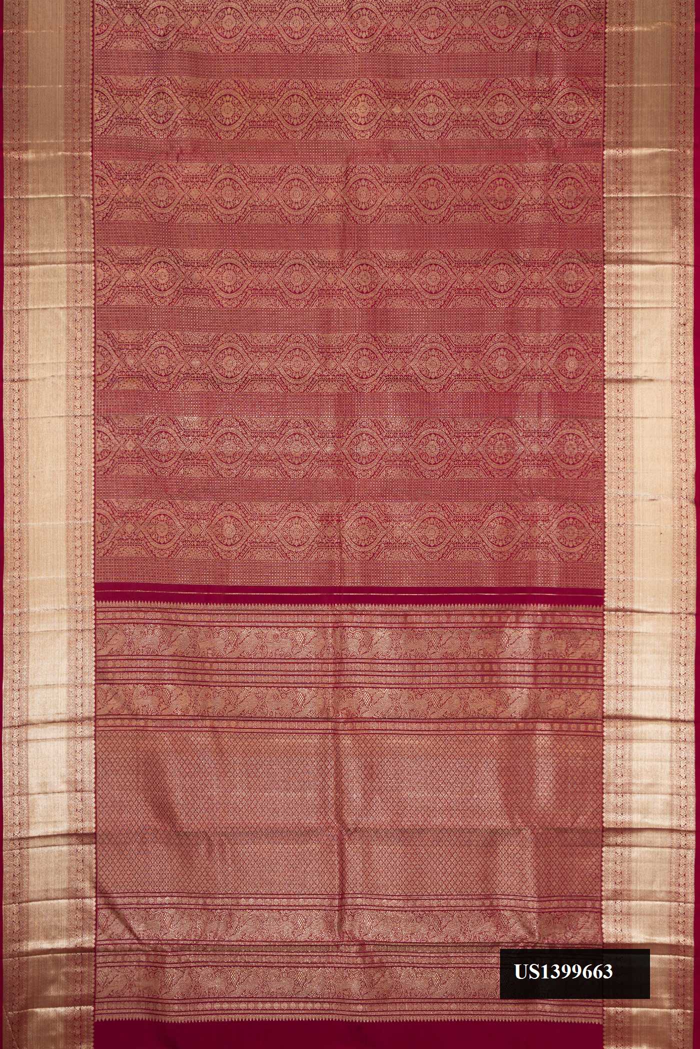 Maroon Dual Tone Kanchipuram Silk Saree with Zari Brocade on the body and Zari Border.  displayed on a mannequin
