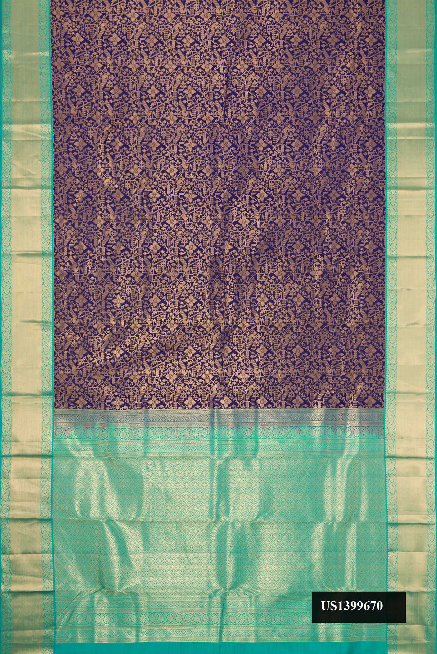 Navy Blue Dual Tone Kanchipuram Silk Saree with Zari Brocade on the body and Zari Border.  displayed on a mannequin