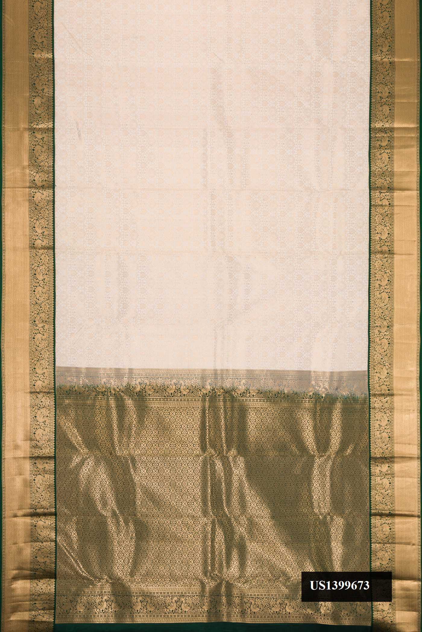 Off White Dual Tone Kanchipuram Silk Saree with Zari Brocade on the body and Zari Border.  displayed on a mannequin