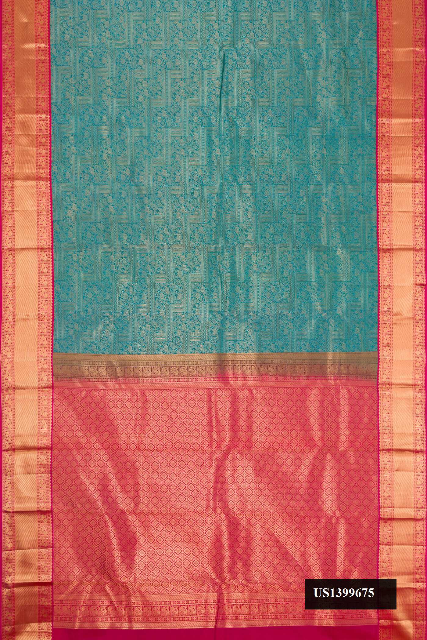 Peacock Blue Dual Tone Kanchipuram Silk Saree with Zari Brocade on the body and Zari Border.  displayed on a mannequin