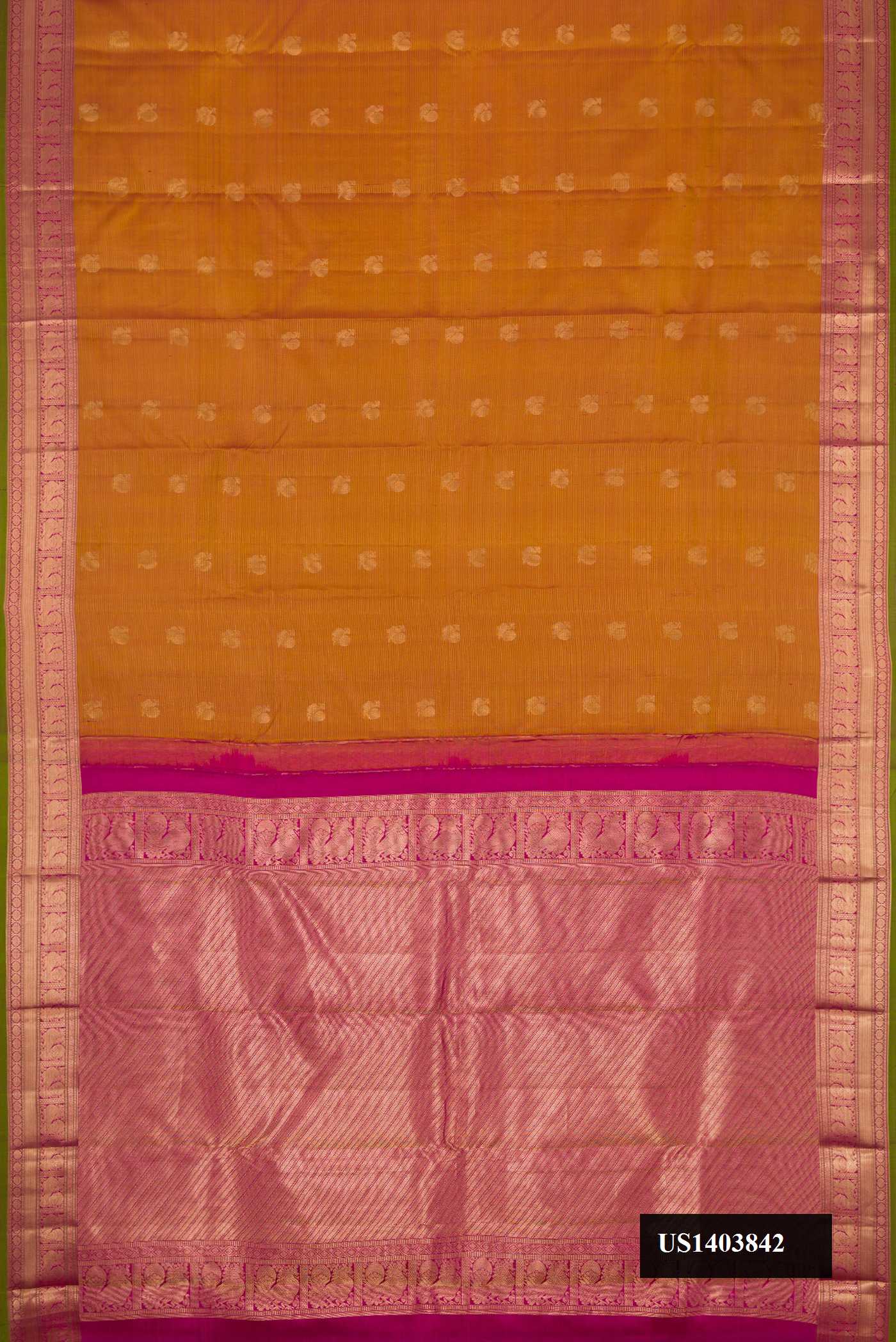 Mustard Dual Tone Kanchipuram Silk Saree with Stripes on the body and Zari Border.  displayed on a mannequin