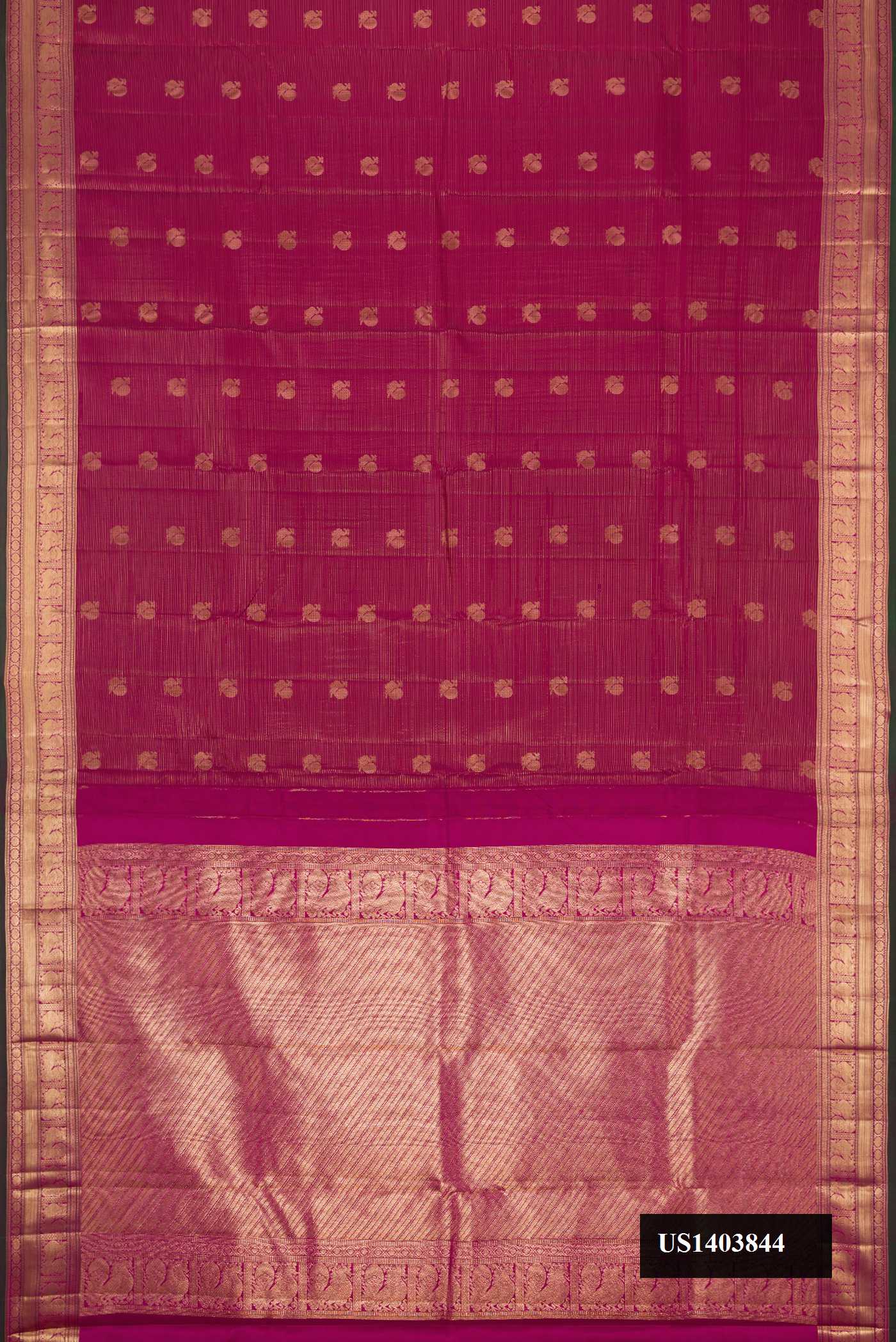 Maroon Dual Tone Kanchipuram Silk Saree with Stripes on the body and Zari Border.  displayed on a mannequin