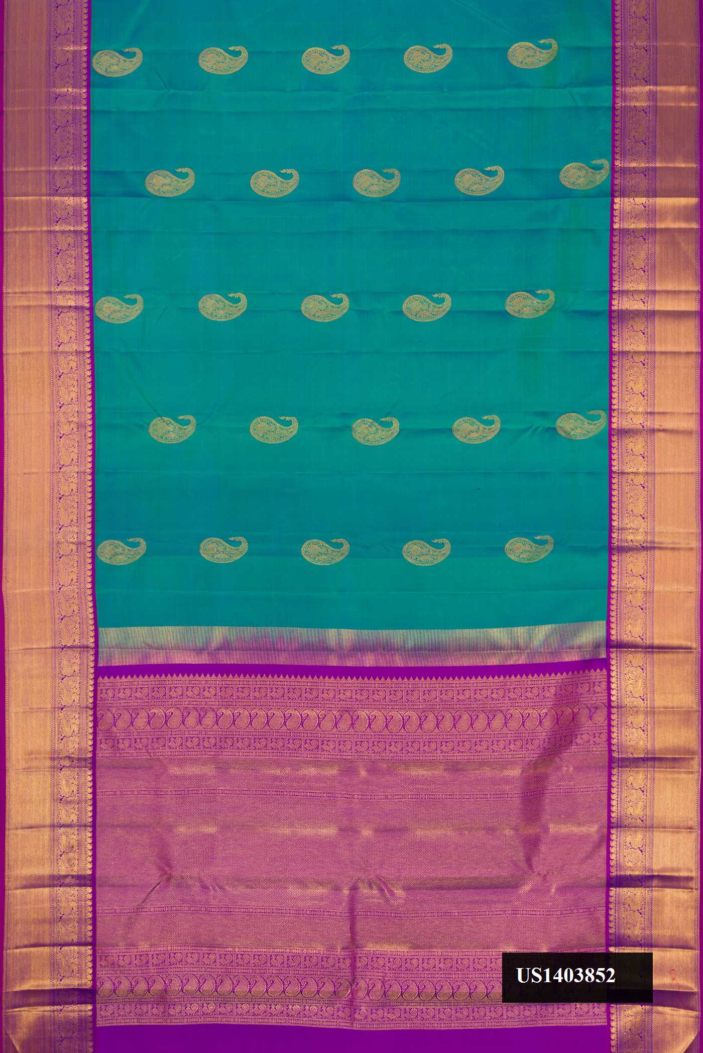 Green Dual Tone Kanchipuram Silk Saree with Zari Butta on the body and Zari Border.  displayed on a mannequin