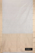 Grey Dual Tone Kanchipuram Silk Saree with Zari Butta on the body and Zari Border.  displayed on a mannequin