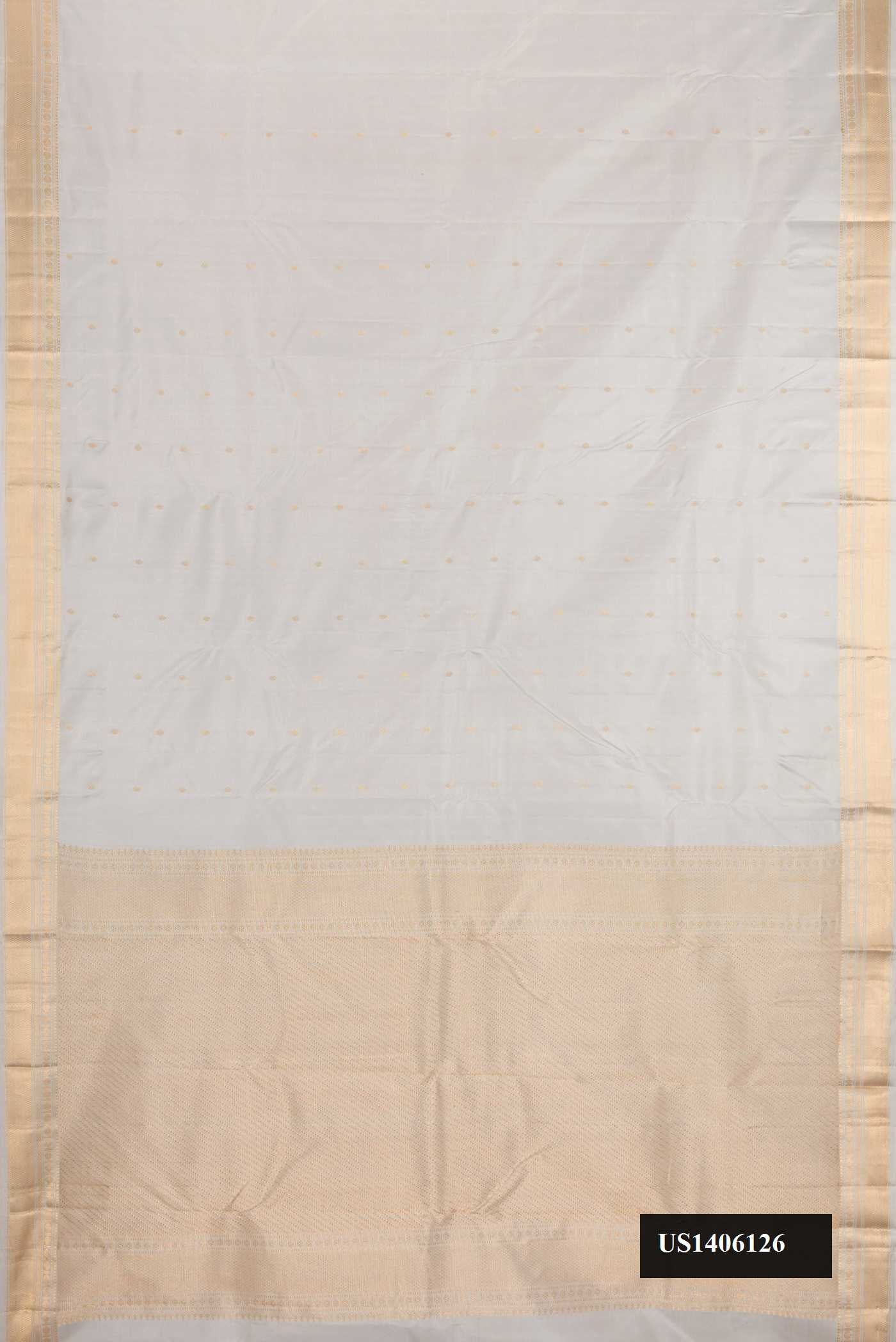 Grey Dual Tone Kanchipuram Silk Saree with Zari Butta on the body and Zari Border.  displayed on a mannequin