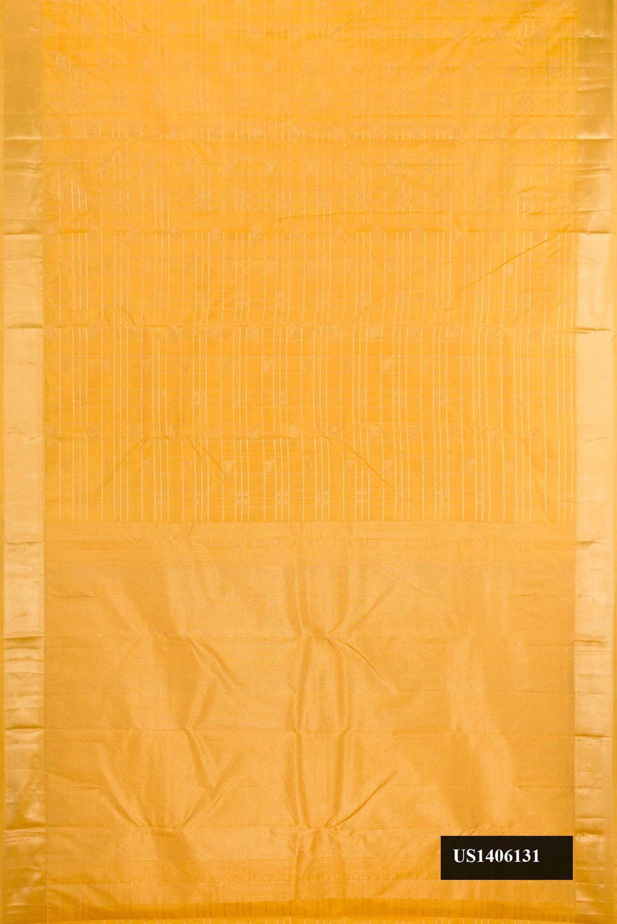 Gold Dual Tone Kanchipuram Silk Saree with Checked design on the body and Zari Border.  displayed on a mannequin