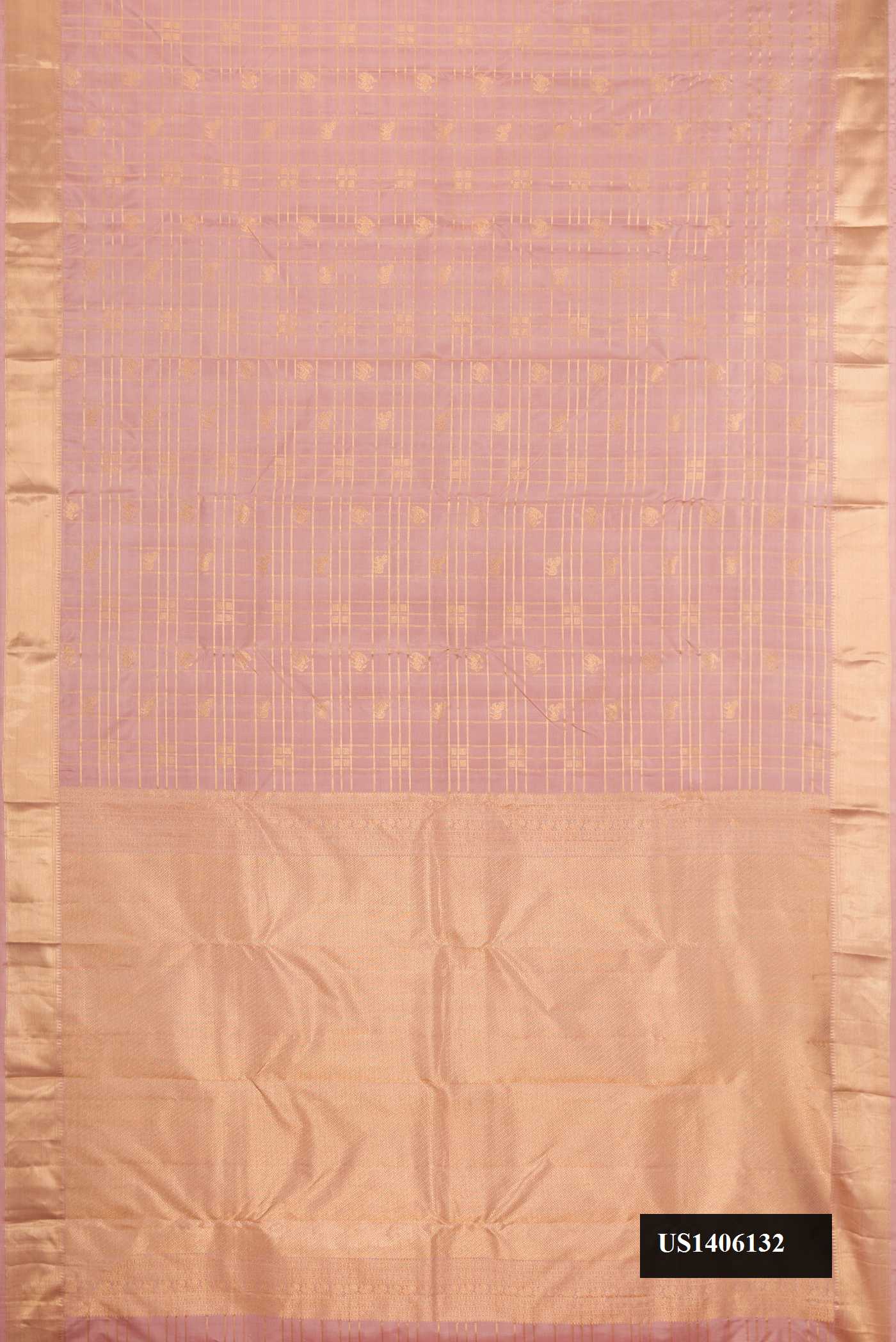 Rose Gold Dual Tone Kanchipuram Silk Saree with Checked design on the body and Zari Border.  displayed on a mannequin