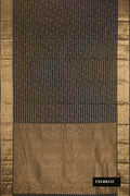 Black Dual Tone Kanchipuram Silk Saree with Checked design on the body and Zari Border.  displayed on a mannequin