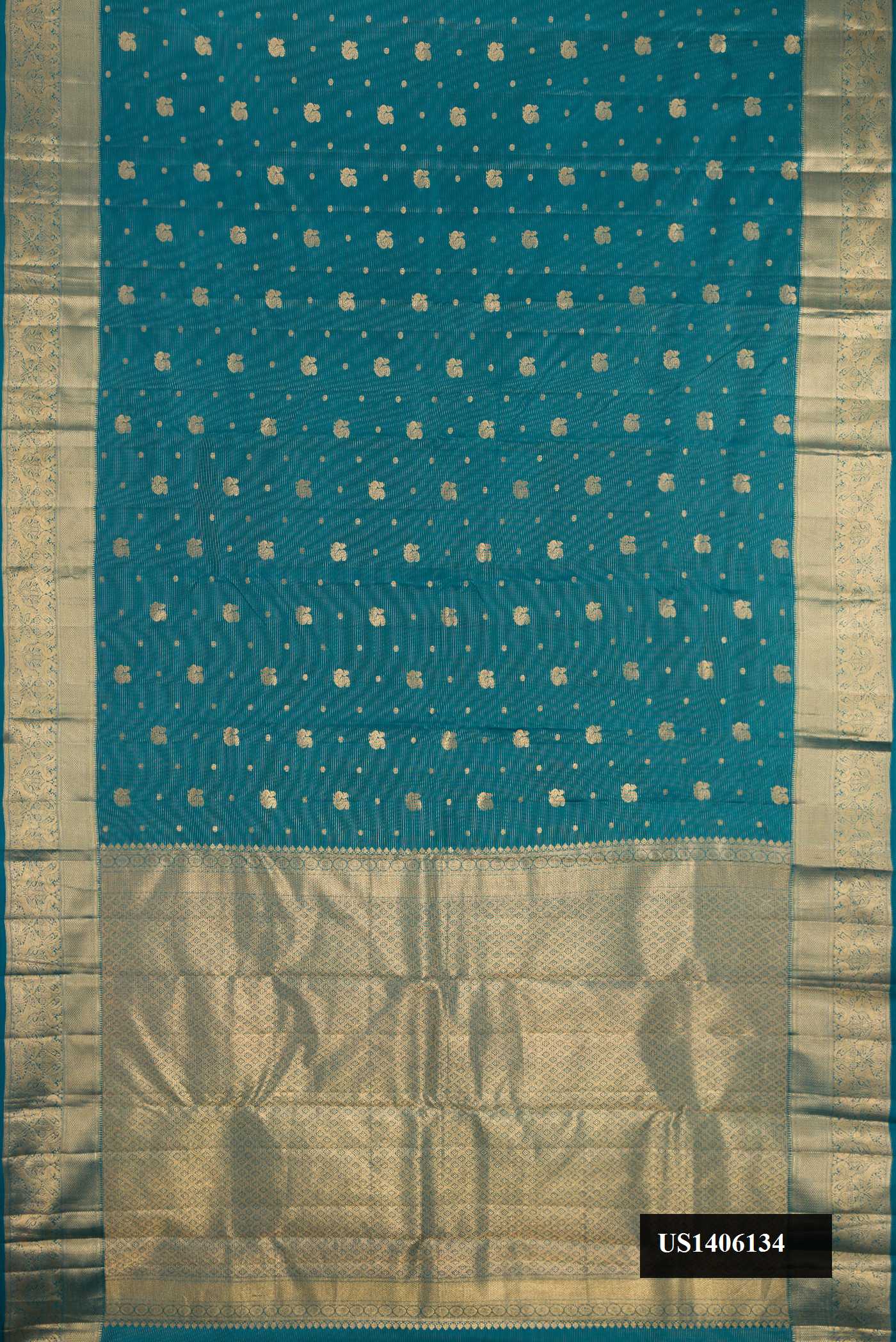 Peacock Blue Dual Tone Kanchipuram Silk Saree with Stripes on the body and Zari Border.  displayed on a mannequin