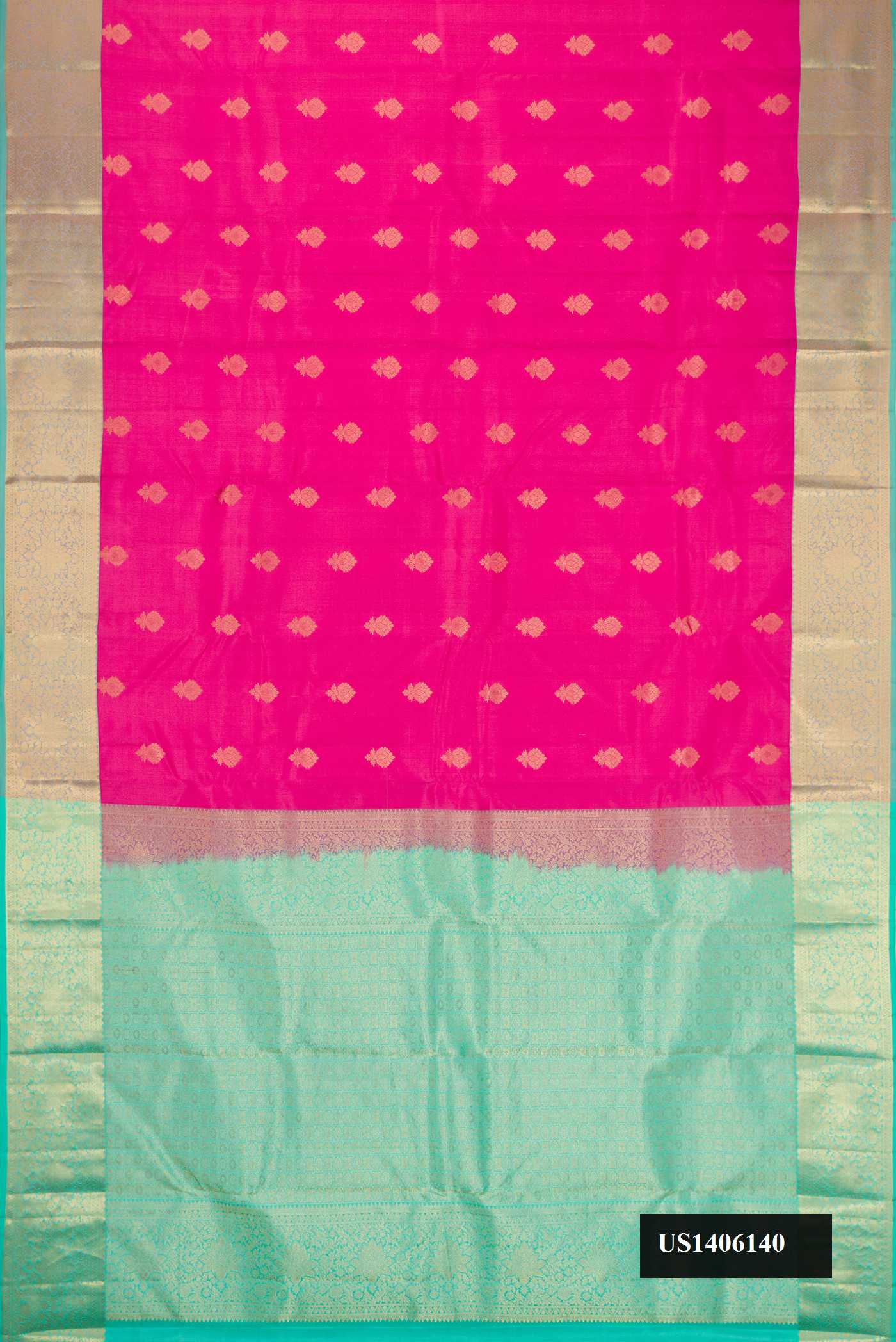 Rose pink Dual Tone Kanchipuram Silk Saree with Zari Butta on the body and Zari Border.  displayed on a mannequin