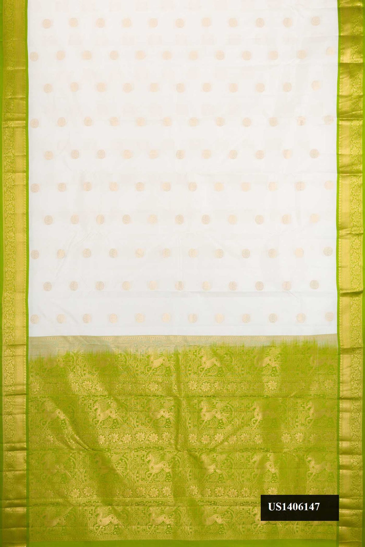White Dual Tone Kanchipuram Silk Saree with Zari Butta on the body and Zari Border.  displayed on a mannequin