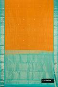 Mustard Dual Tone Kanchipuram Silk Saree with Stripes on the body and Zari Border.  displayed on a mannequin