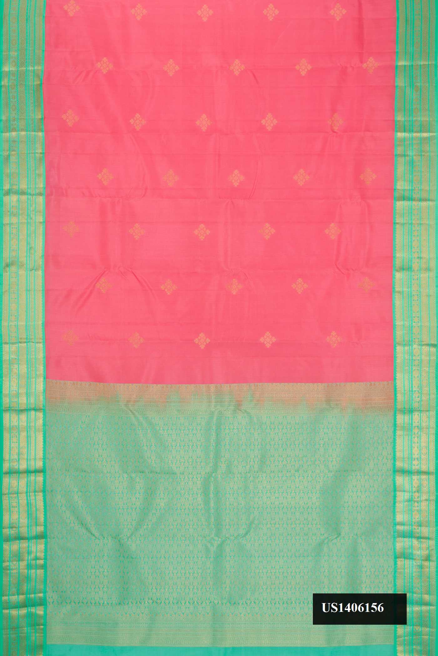 Pink Dual Tone Kanchipuram Silk Saree with Zari Butta on the body and Zari Border.  displayed on a mannequin