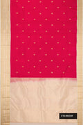 Dark Pink Dual Tone Kanchipuram Silk Saree with Zari Butta on the body and Zari Border.  displayed on a mannequin