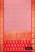 Rose Gold Dual Tone Kanchipuram Silk Saree with Zari Butta on the body and Zari Border.  displayed on a mannequin