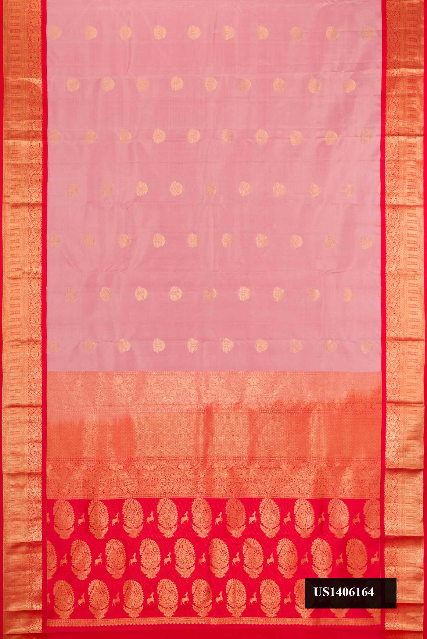 Rose Gold Dual Tone Kanchipuram Silk Saree with Zari Butta on the body and Zari Border.  displayed on a mannequin
