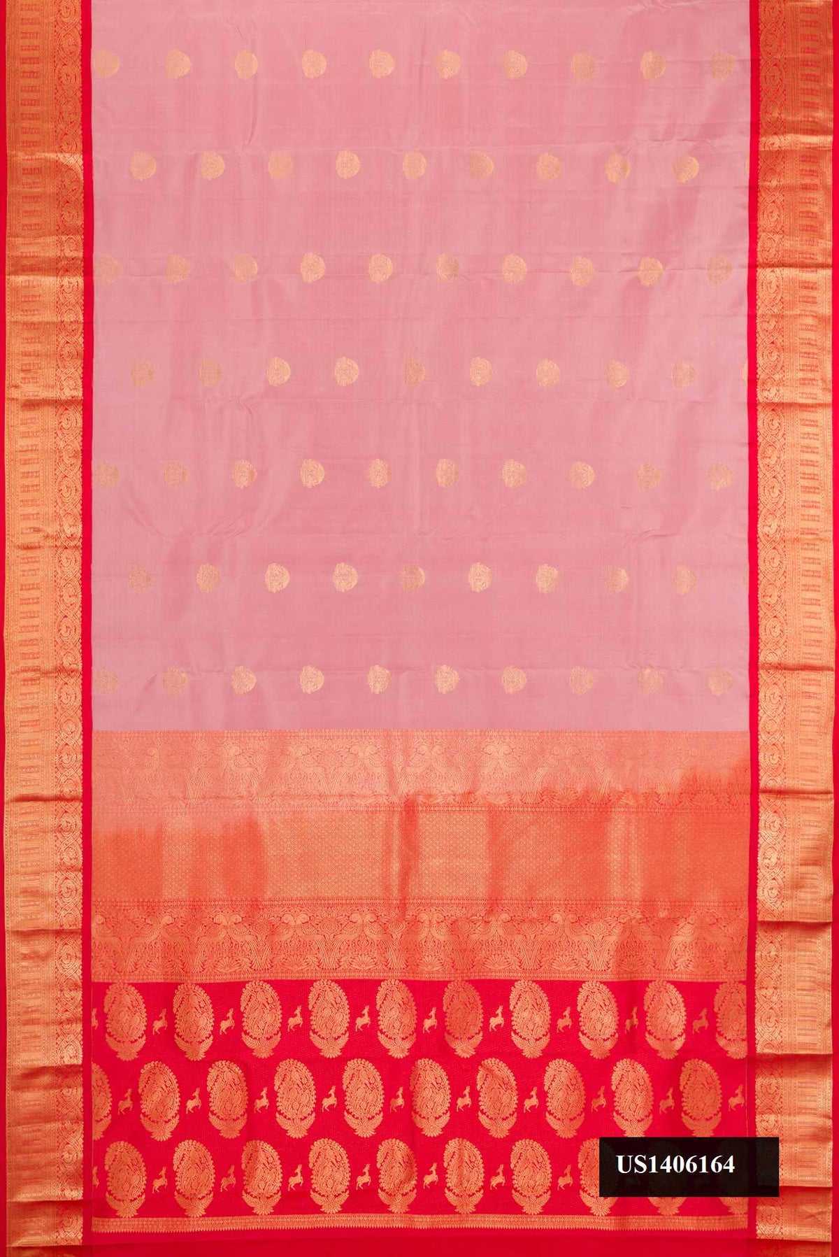 Rose Gold Dual Tone Kanchipuram Silk Saree with Zari Butta on the body and Zari Border.  displayed on a mannequin