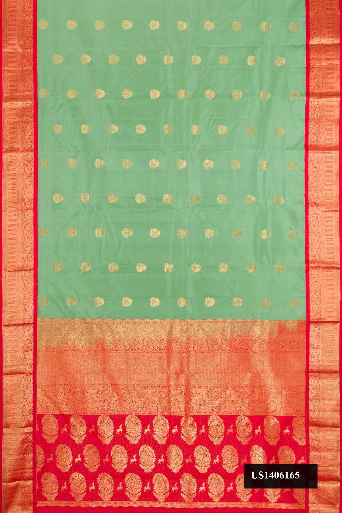 Light Green Dual Tone Kanchipuram Silk Saree with Zari Butta on the body and Zari Border.  displayed on a mannequin