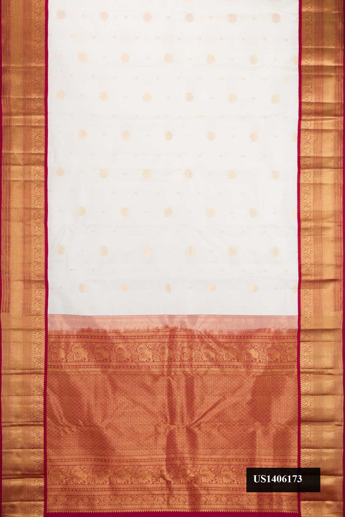 White Dual Tone Kanchipuram Silk Saree with Zari Butta on the body and Zari Border.  displayed on a mannequin