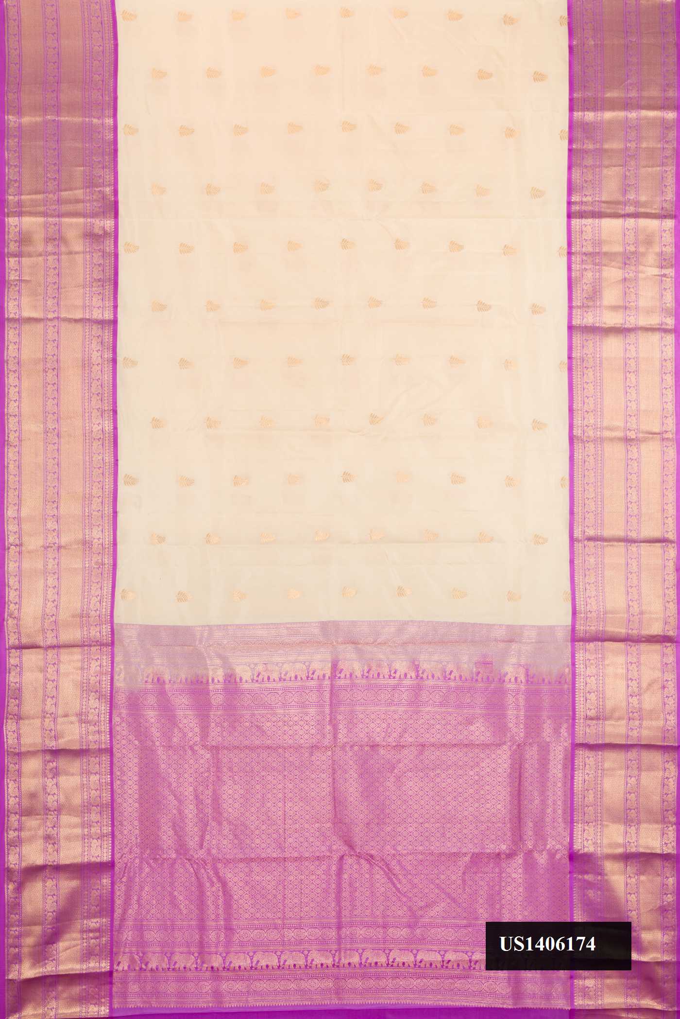 Sandal Dual Tone Kanchipuram Silk Saree with Zari Butta on the body and Zari Border.  displayed on a mannequin